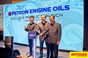 Mr Gary Cheah, Mr Choong Kum Choy and En Mohd Pauzi Mohd Din launch gambit during the Petron Malaysia HTP Engine Oil launch