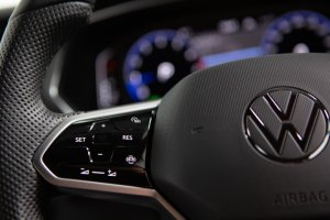 haptic-touch control multi-function steering wheel